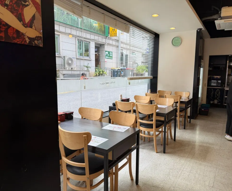 Bar-style solo seats in front of the conveyor-belt sushi rail