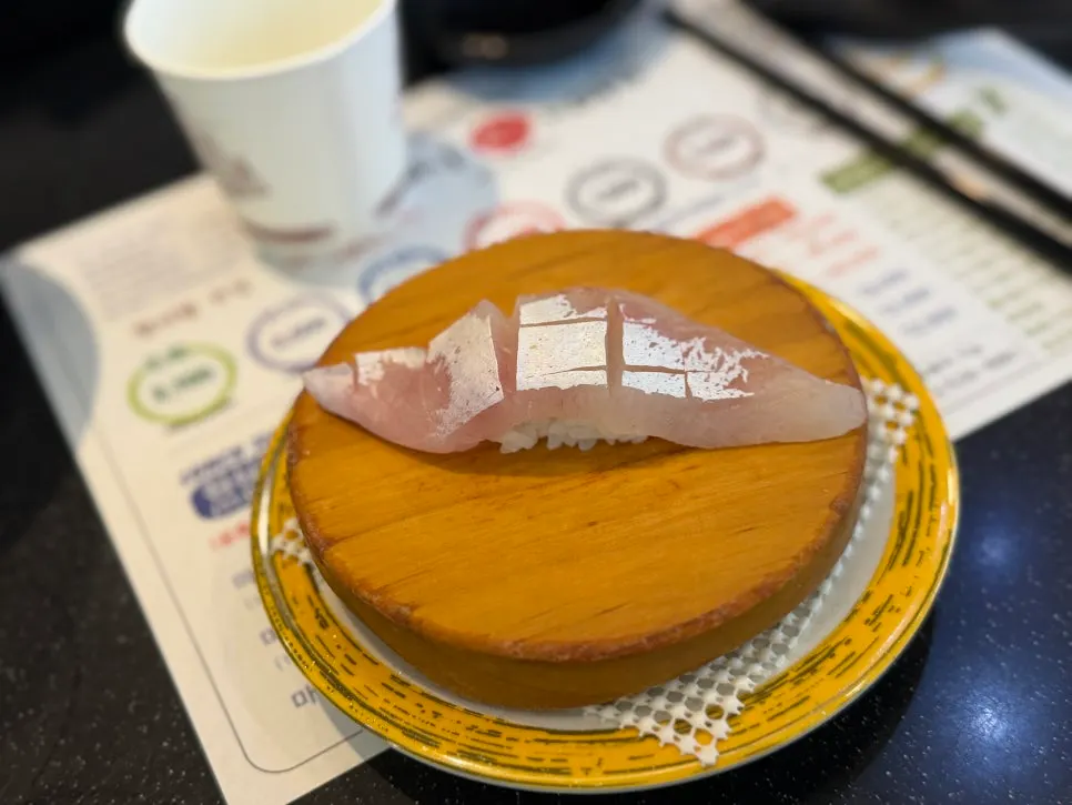 A plate of sushi on the table