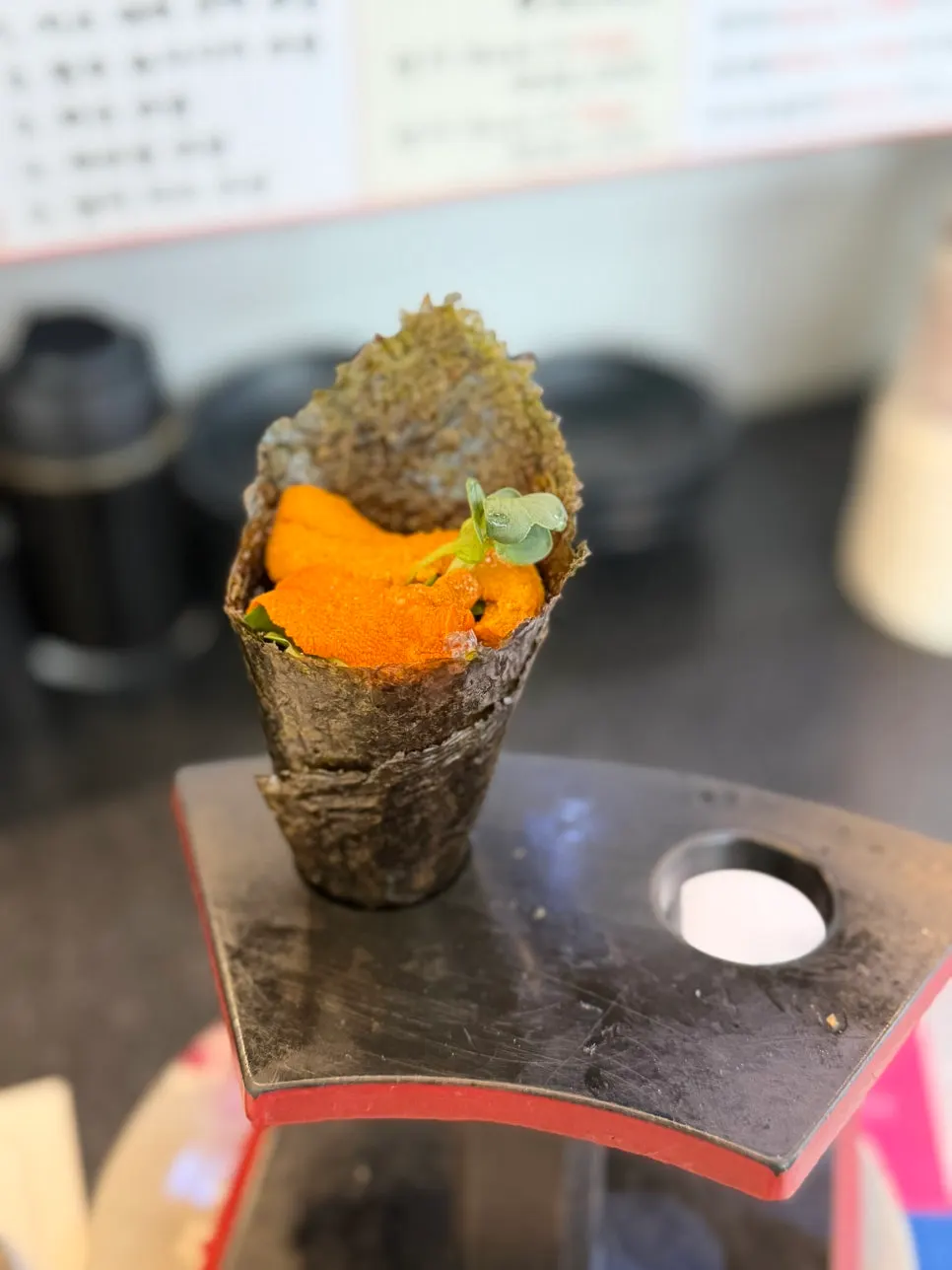 A plate of sea urchin maki sushi