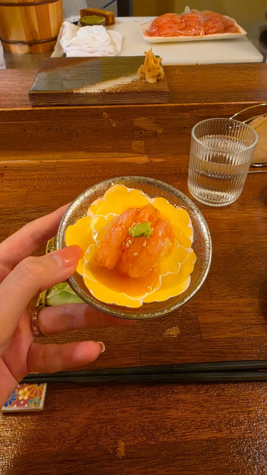 Sweet shrimp nigiri topped with kimi sauce
