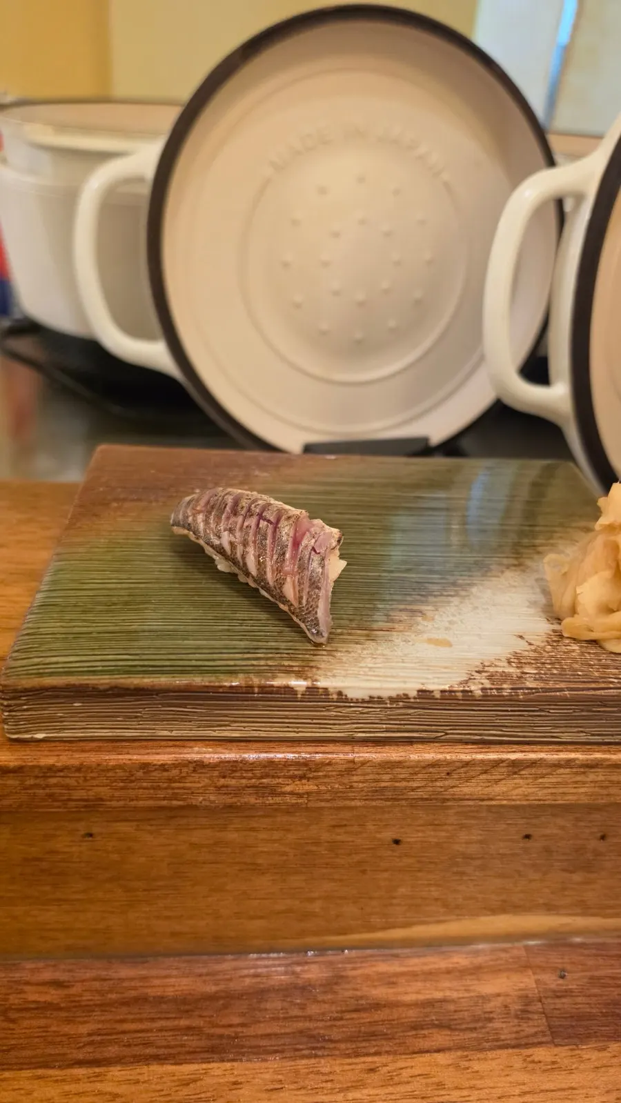 Abalone nigiri topped with liver sauce