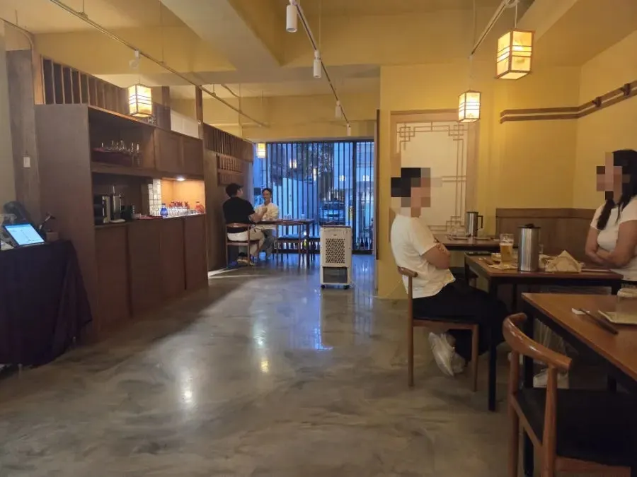 Interior table seats and bar seats at Sakai