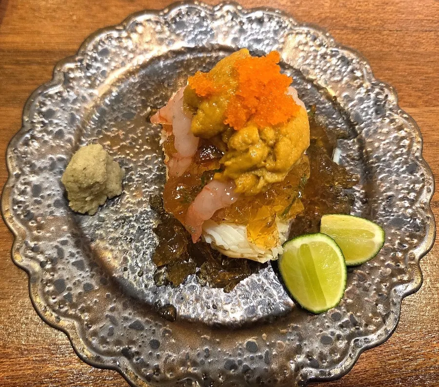 Uni and sweet shrimp piled on top of picked crab meat