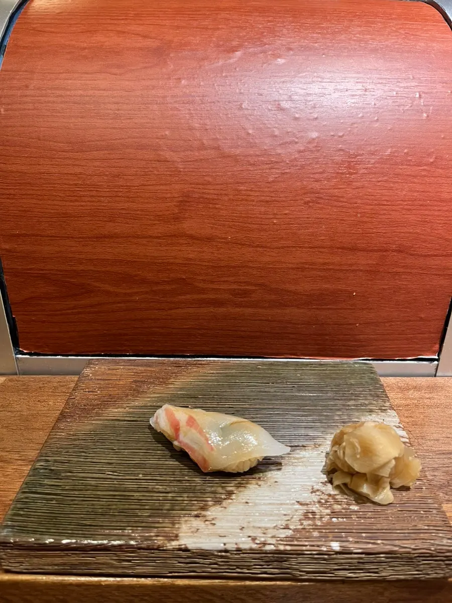 A single piece of sweet shrimp (amaebi) nigiri at Sakai