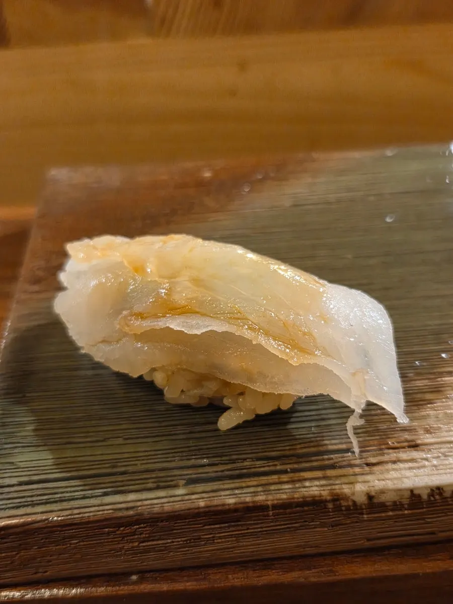 Filefish nigiri topped with its own liver