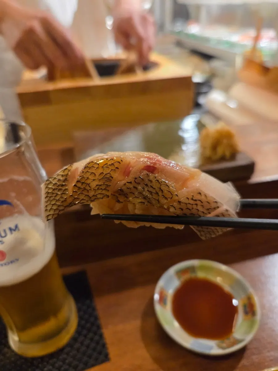 Torch-seared benjari (grunt fish) nigiri
