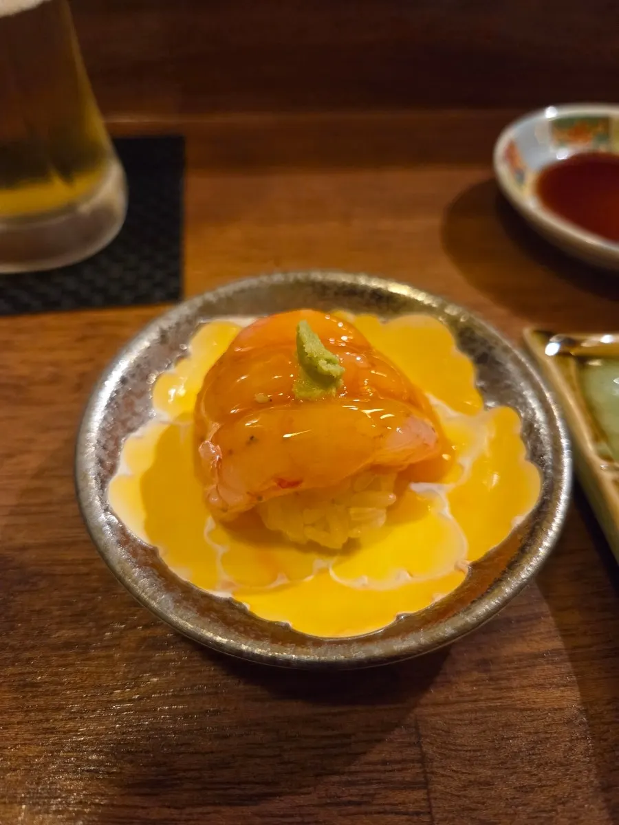Sweet shrimp nigiri topped with kimizu sauce