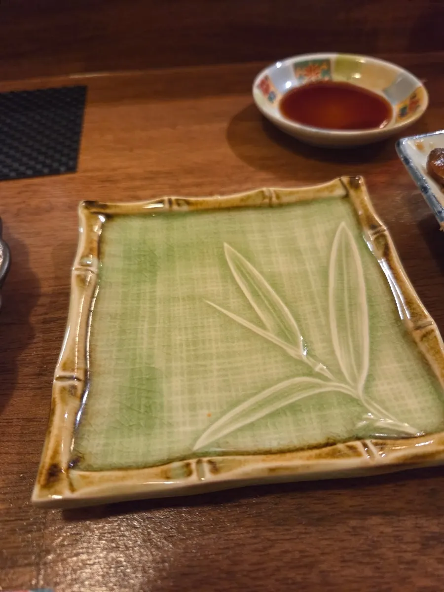 Empty dishes after finishing the meal at Sakai