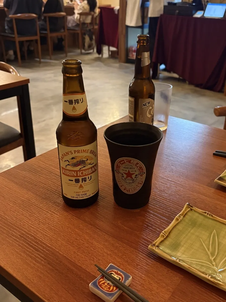 A glass of Kirin draft beer on the table