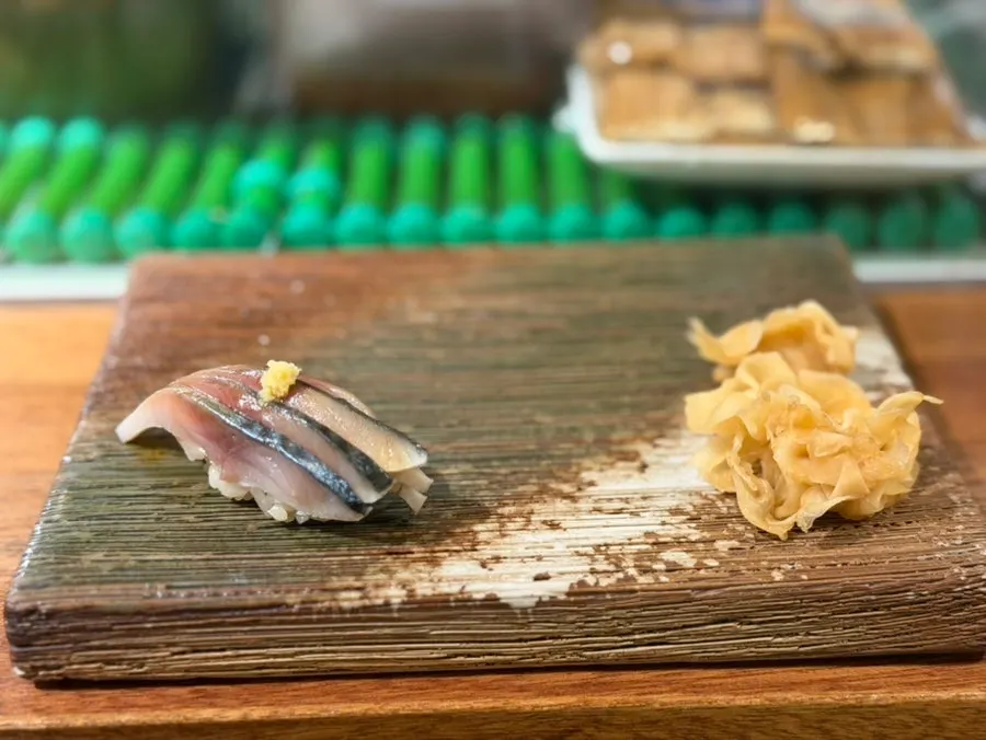 Horse mackerel nigiri topped with scallion paste