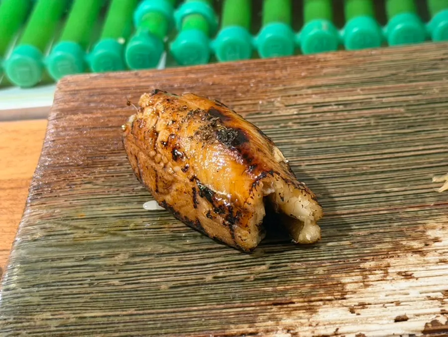 A finished piece of anago nigiri
