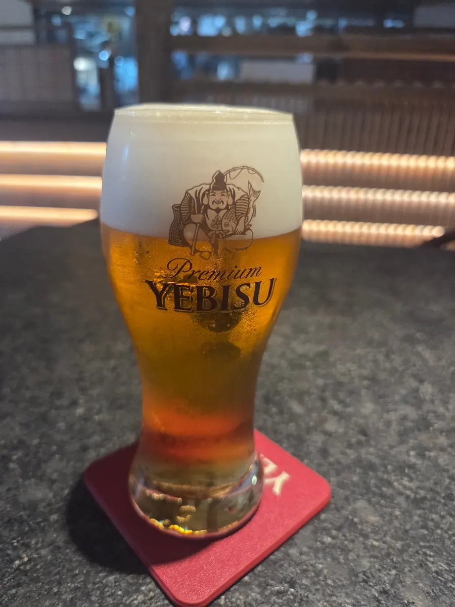 Yebisu draft beer ordered while waiting for the food