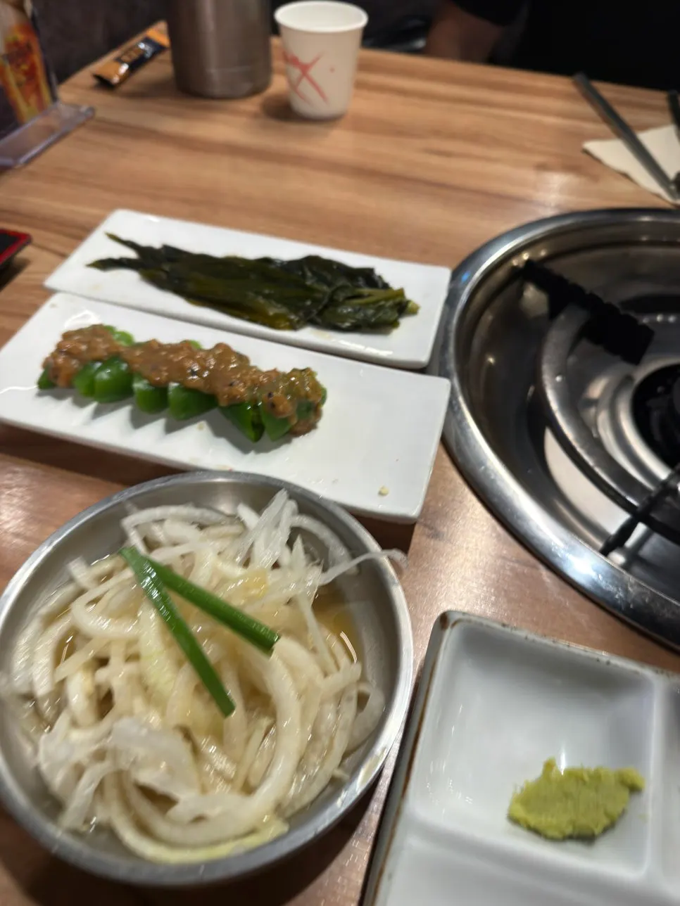 Basic side dishes of cucumber peppers, wild garlic, and pickled onions