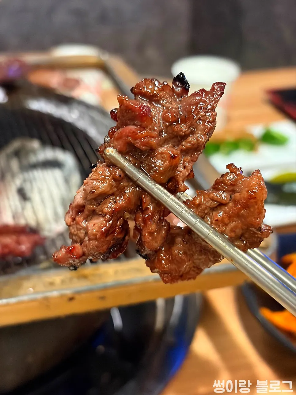 A grilled piece of Uno charcoal galbi