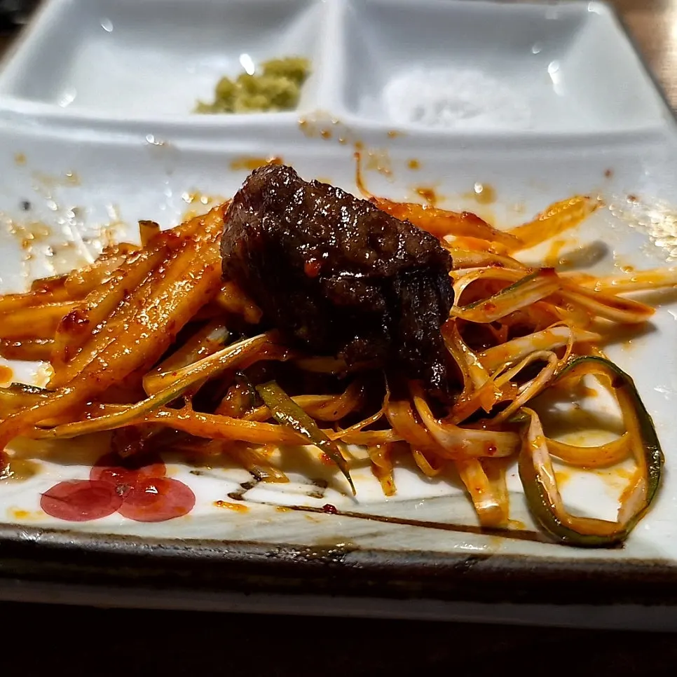 A fully grilled piece of charcoal galbisal