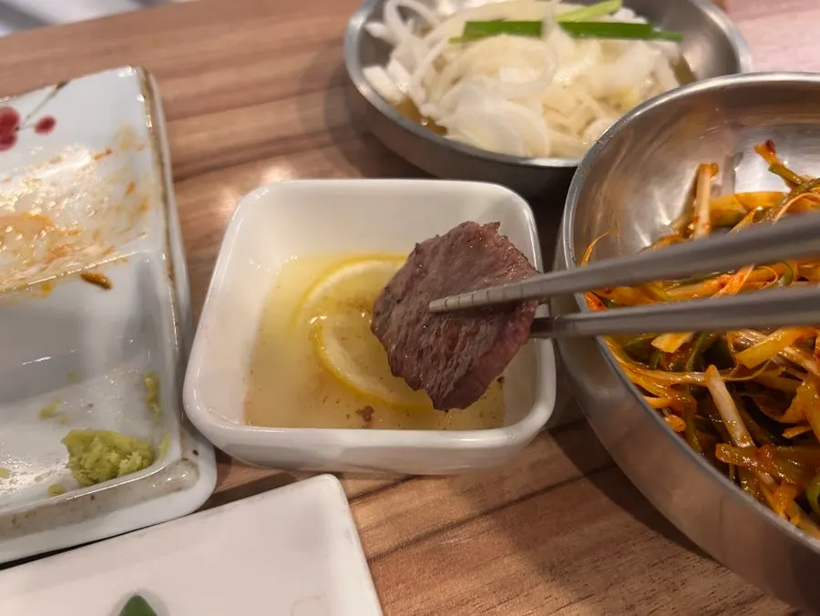 Beef tongue dipped in lemon sauce