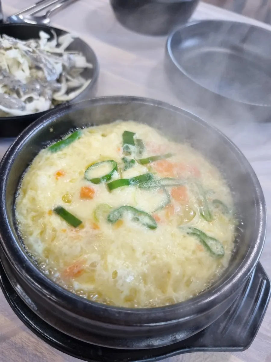 Full spread of side dishes at Seommaeul