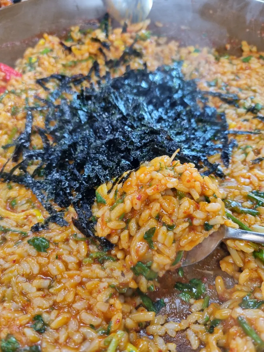 Rice mixed into the leftover sauce