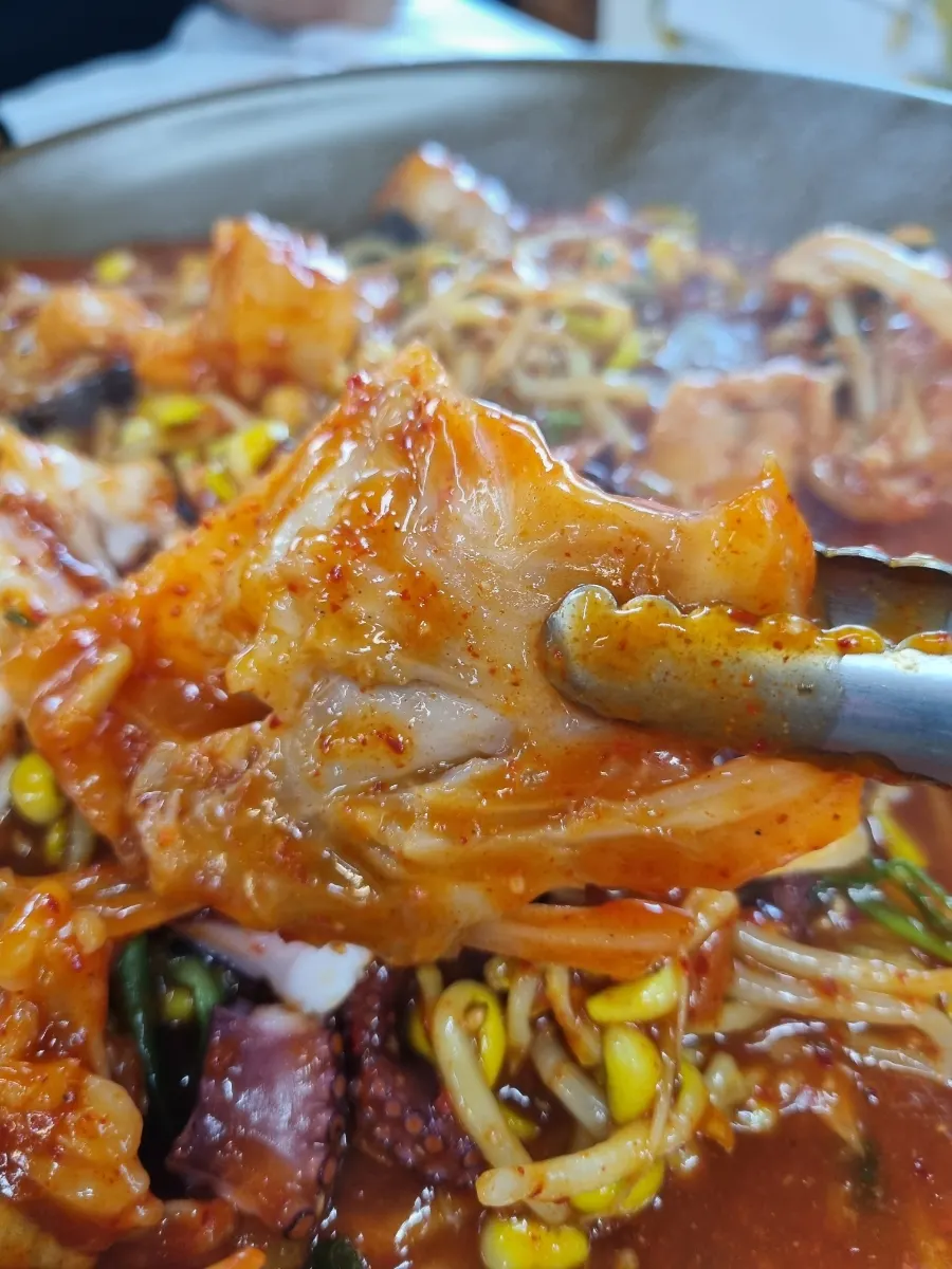 Meal spread with the monkfish-octopus braise and rice