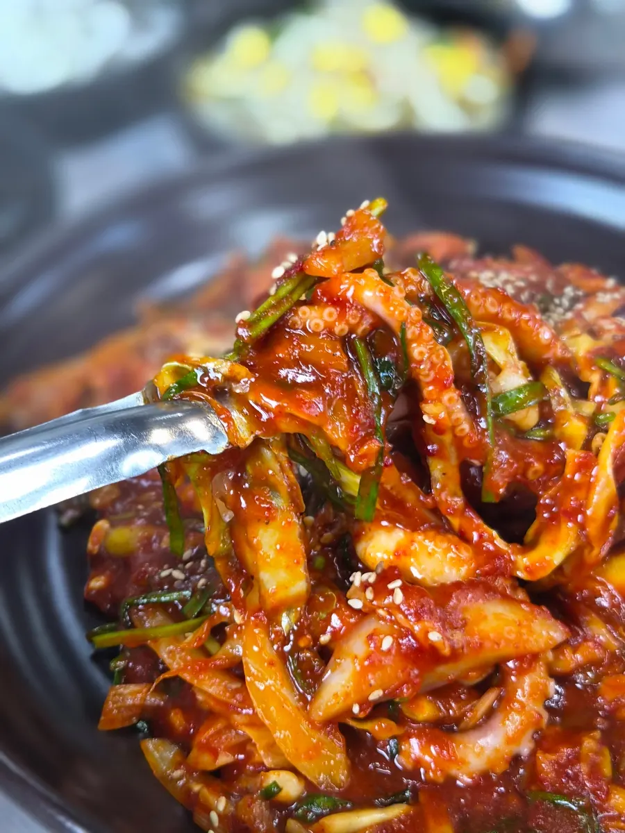 Close-up of nakjibokkeum with spicy sauce