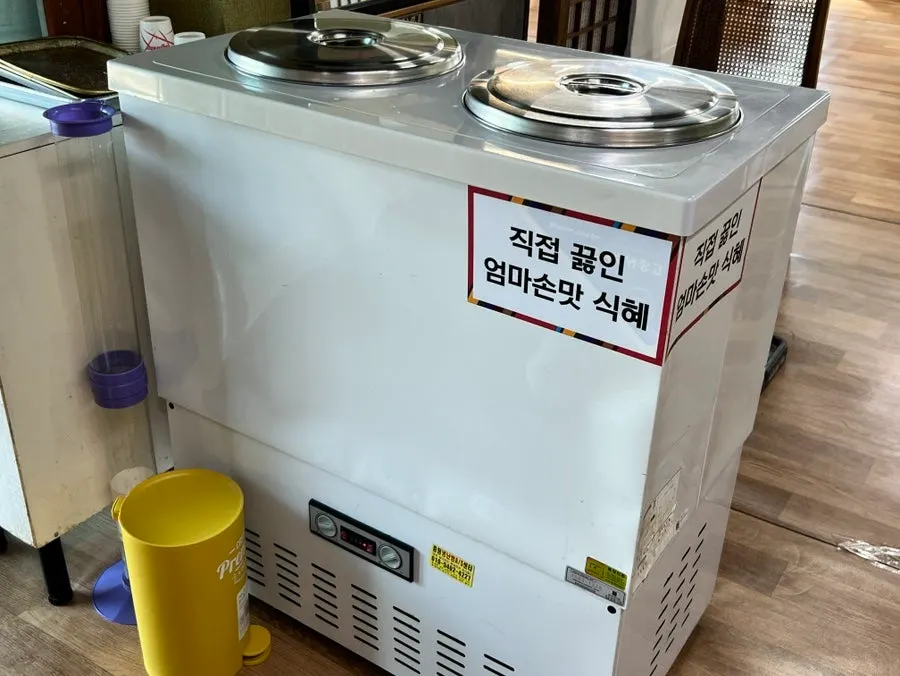 Homemade sikhye set out near the entrance