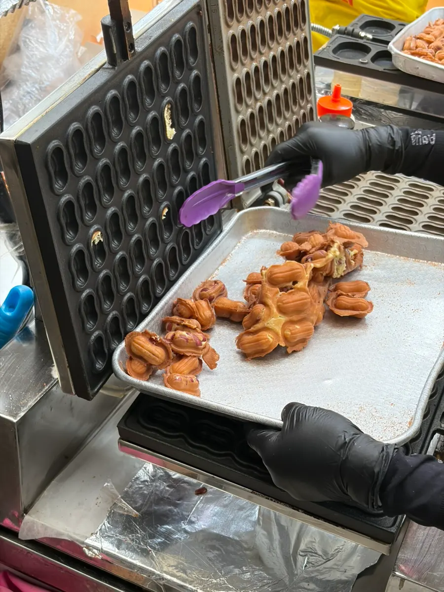 Peanut bread pouring out of the mold