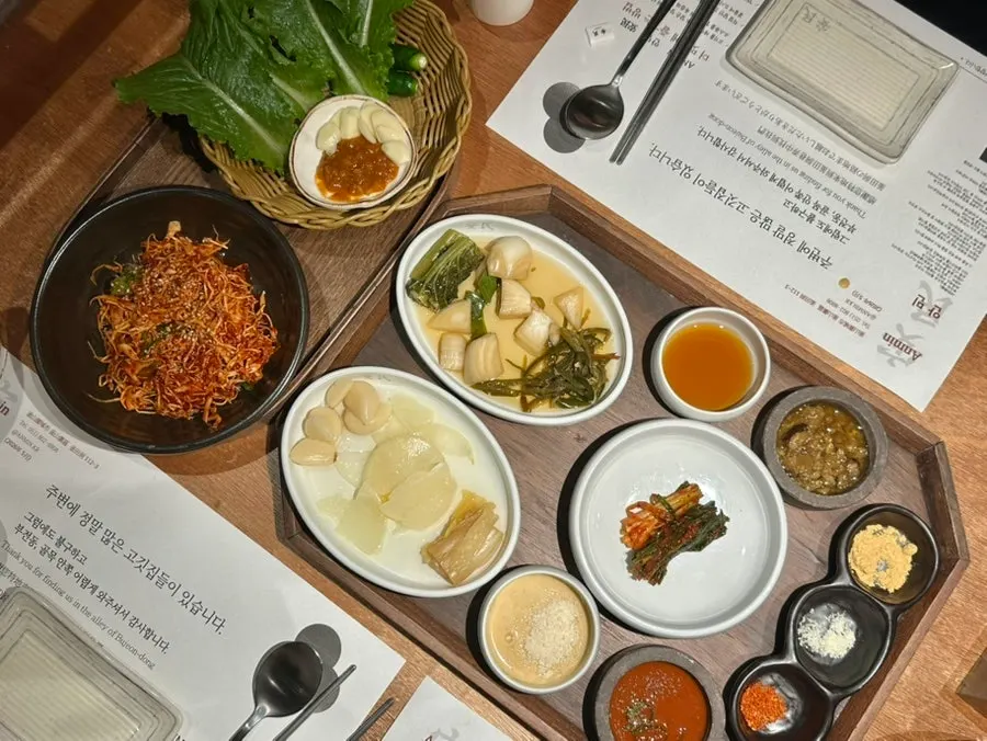 Base spread with pickles, lettuce wraps, and seven sauces