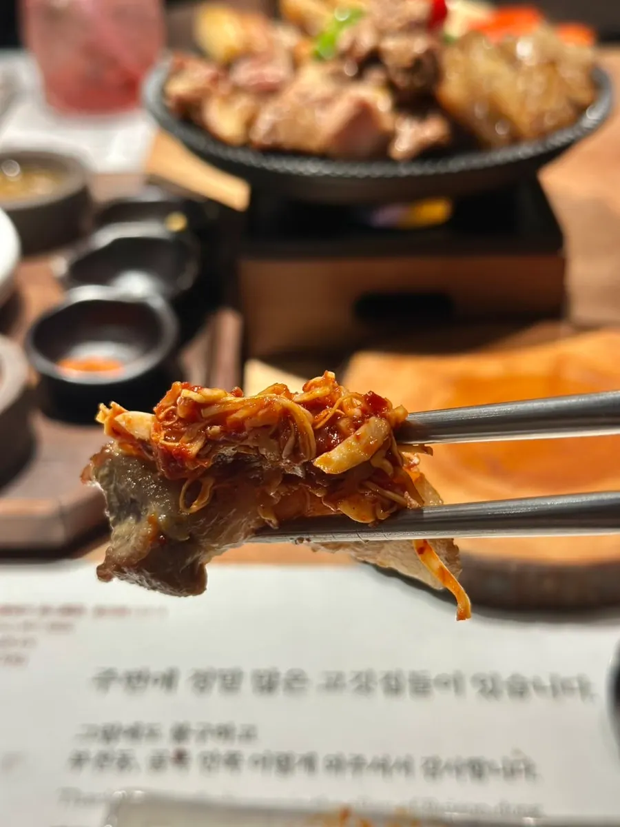 Plate of grilled meat set on the solid-fuel brazier
