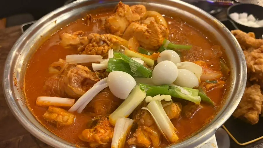 Plate with dakdoritang chicken pieces served out