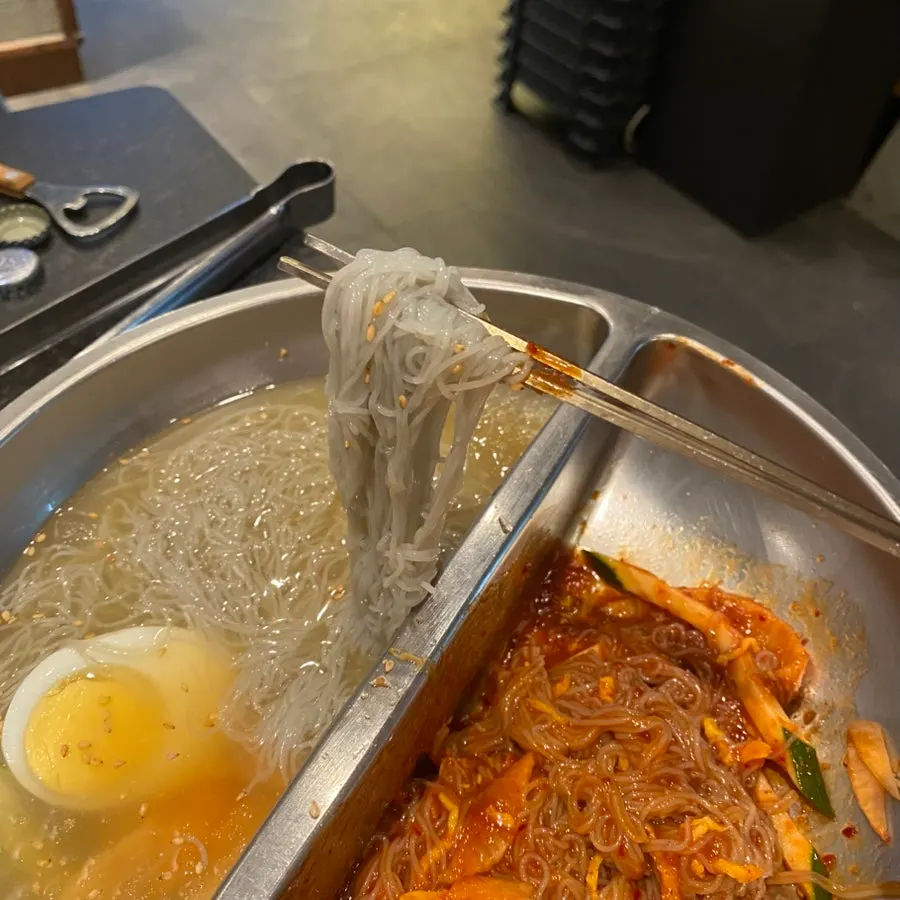 Chewy noodles in half-and-half naengmyeon