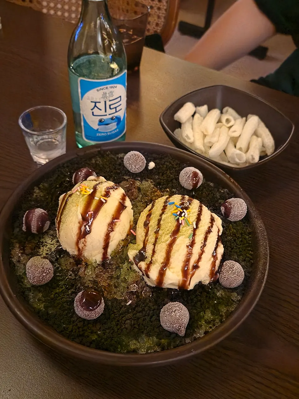 Matcha choco ice bingsu served on the table