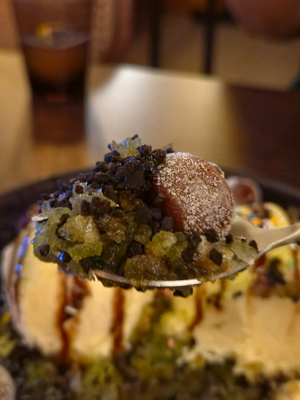 Spooning up the matcha choco ice bingsu