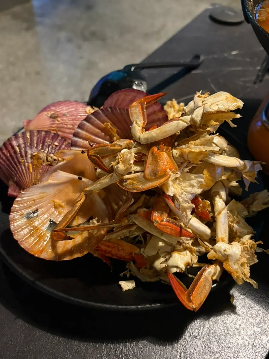 A bowl of crab shells picked clean of meat