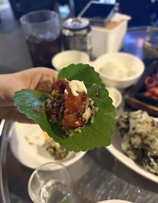Rice ball topped with dakbal and mayo