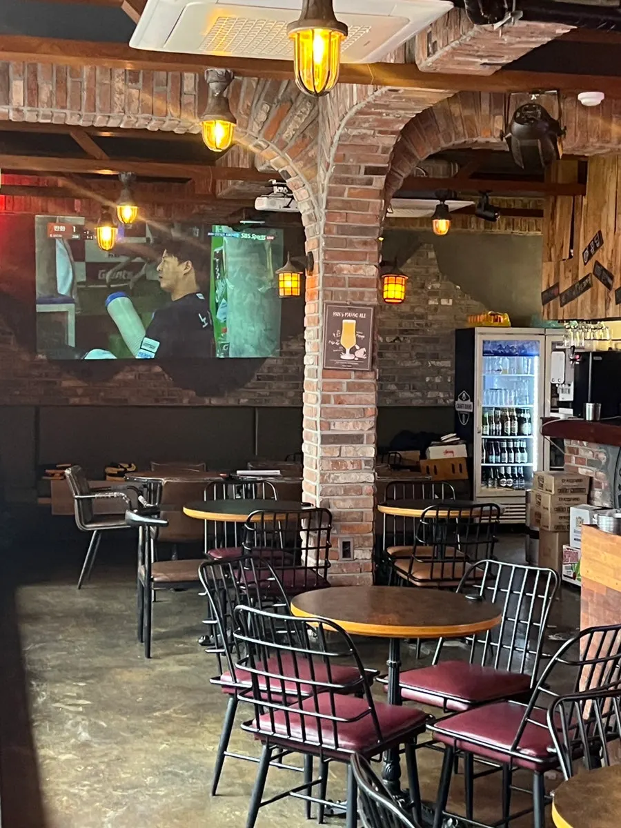 Beer-bar seating by the windows