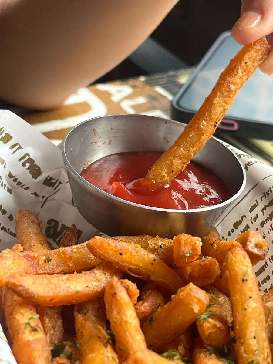 Crispy Cajun fries with ketchup