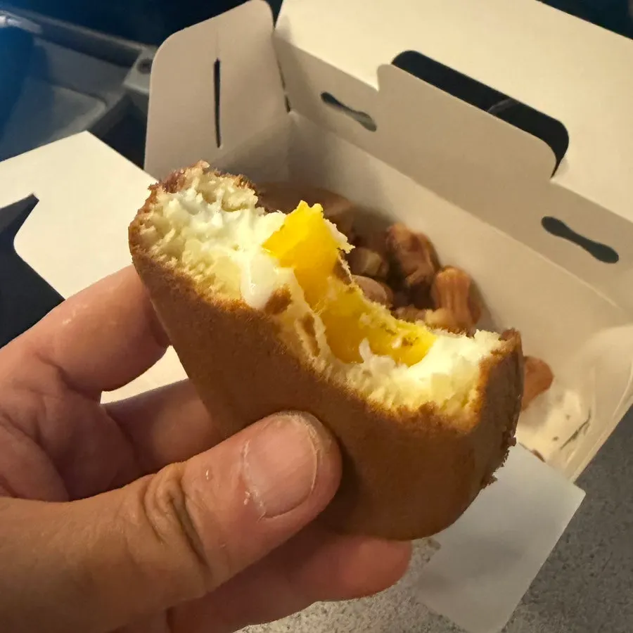 Close-up of golden-baked egg bread and peanut bread