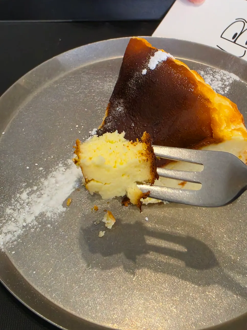 Eating Basque cheesecake with a fork