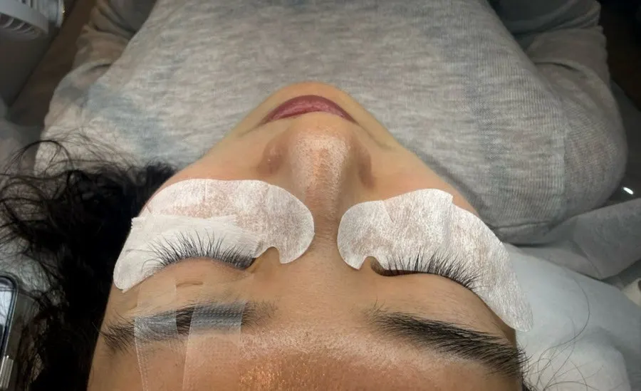 Eyelash extension procedure with eye patches under the eyes