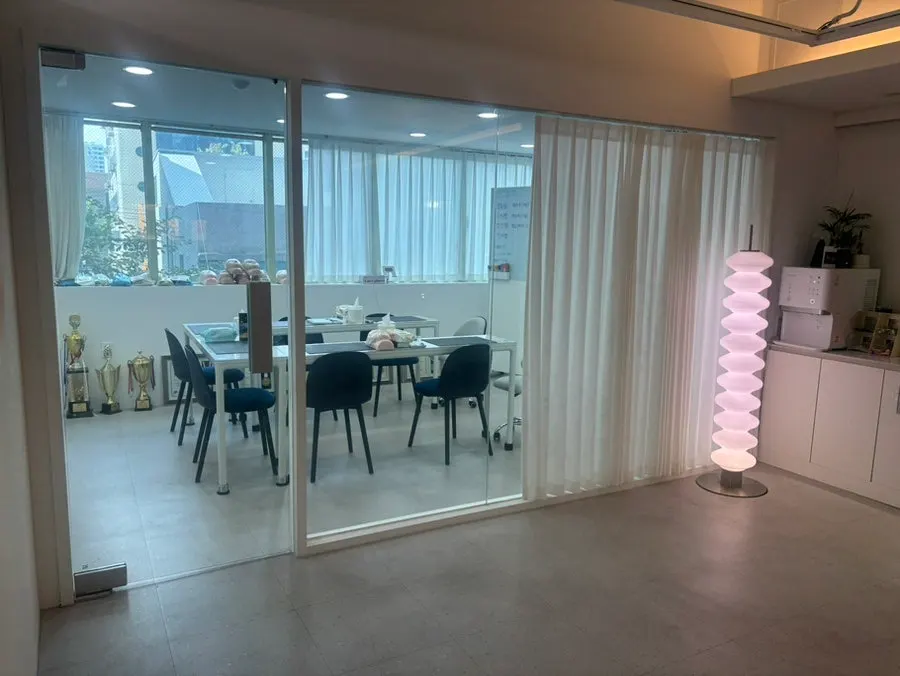 Double D shop space with warm lighting
