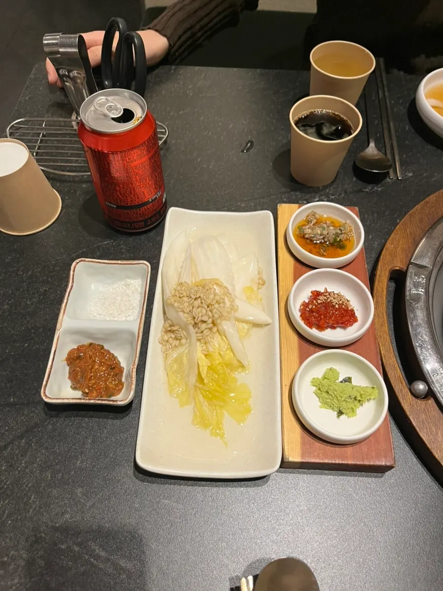 Table with spoons, chopsticks and wet wipes