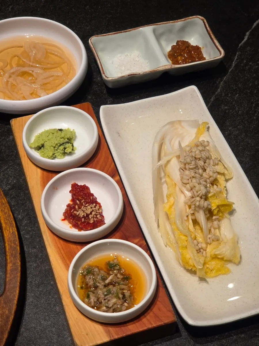Plate of wasabi and pickles among the side dishes