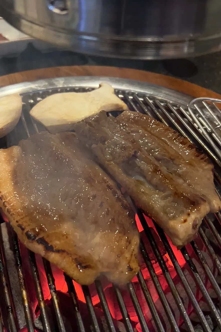 Squid muchim served alongside marinated ribs