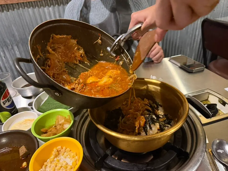 Chewy rice cakes lifted from the pot