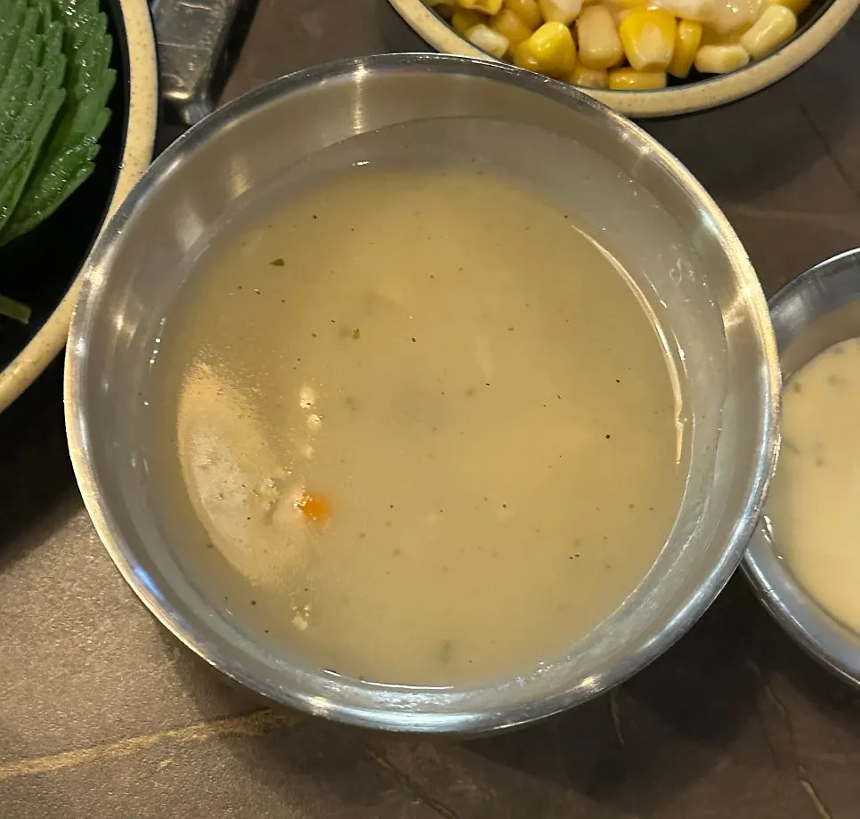 Basic banchan spread including soup and acorn jelly