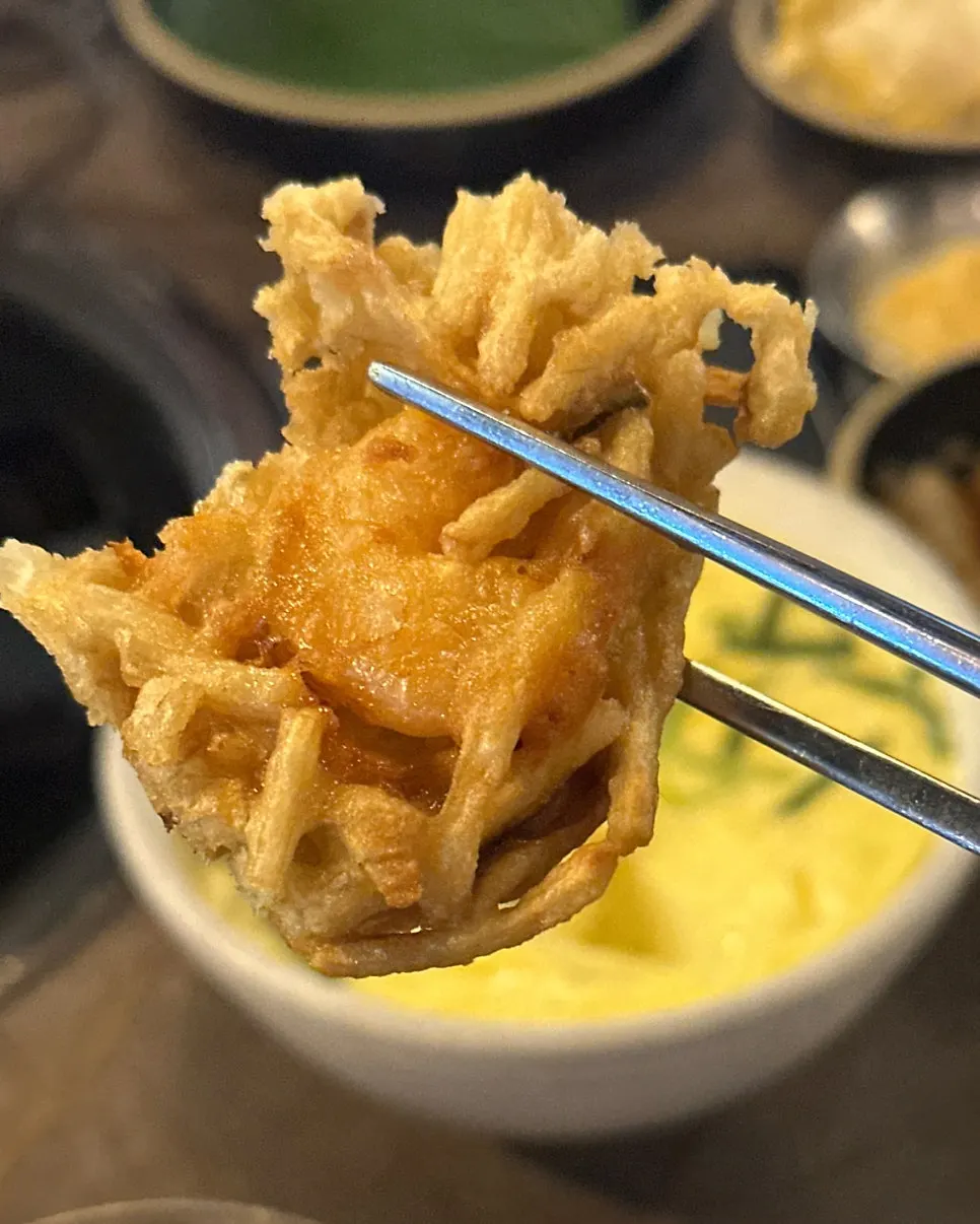 Cross-section of golden, pan-fried seafood potato pancake