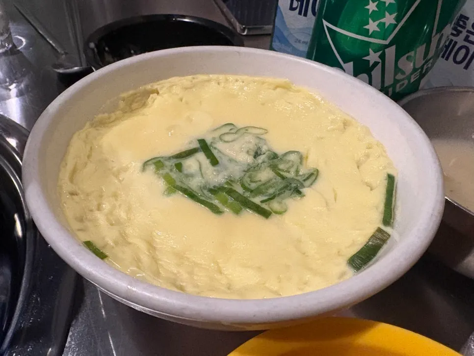 Galbijjim toppings and side menu spread