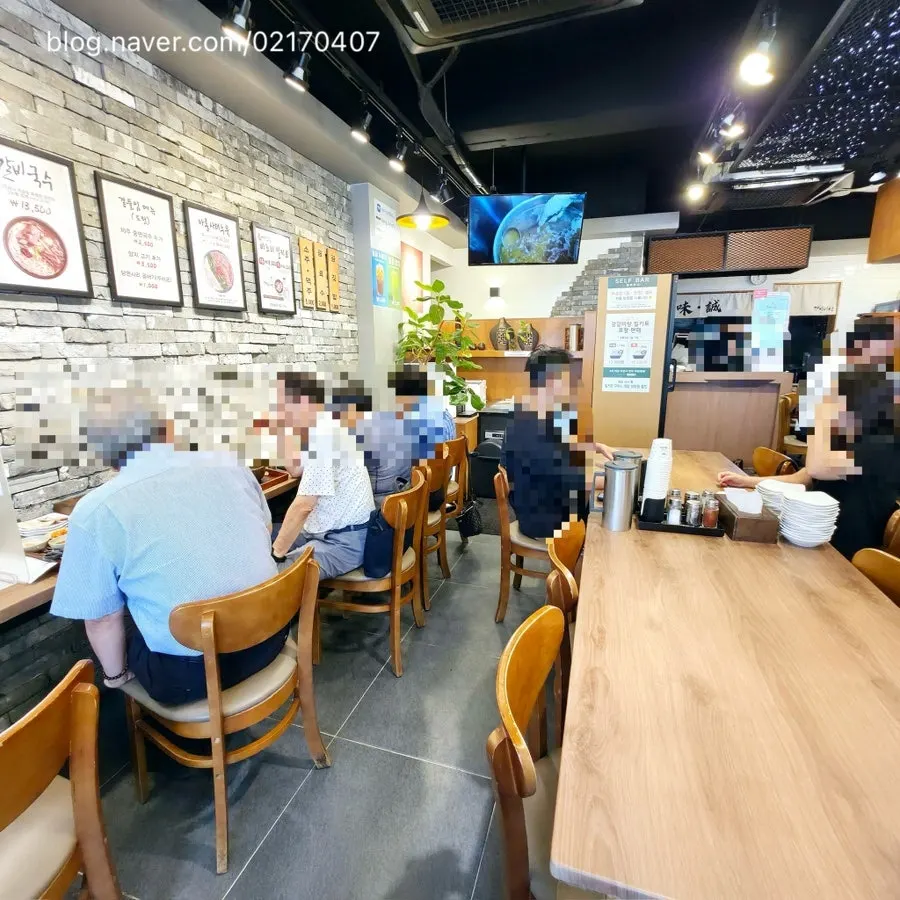 Interior of Gang Galbitang Seomyeon full of customers