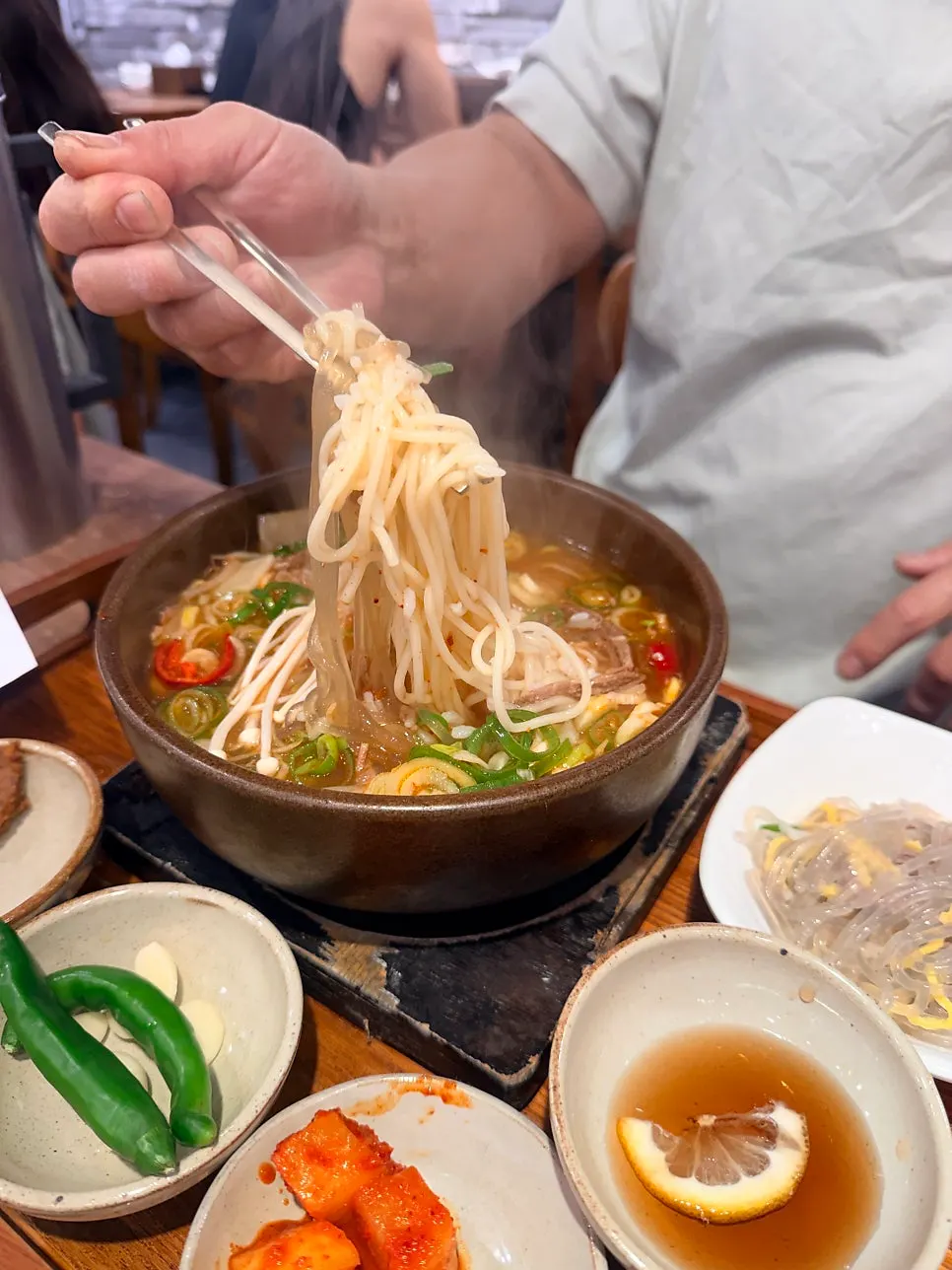 A spoonful of spicy galbi gukbap