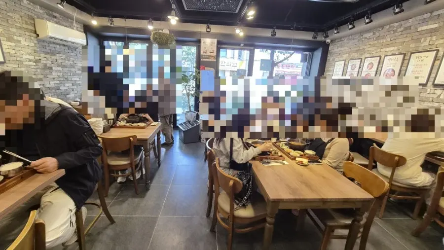 Interior of Gang Galbitang Seomyeon with a lunchtime wait